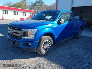 2018 Ford F-150 XL with VIN 1FTEX1EP5JKC90237, listed as a IAAI auction lot 41293407 with 140,873 mi miles. Bid and sale history available at carsss.com. Image 17.