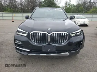2020 BMW X5 xDrive40i with VIN 5UXCR6C09L9C95232, listed as a Copart auction lot 60697765 with 30,017 mi miles and Salvage title. Bid and sale history available at DreamBid. Image 5.