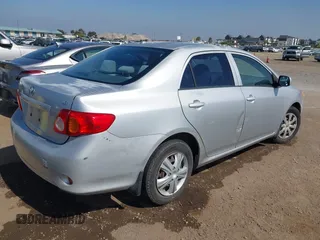 2009 Toyota Corolla z VIN JTDBL40E099033012, wystawiony jako IAAI lot #42565753 z przebiegiem 188 314 mil mil oraz . Historia ofert i sprzedaży dostępna na DreamBid. Obrazek 4.