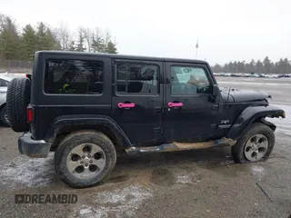2016 Jeep Wrangler Unlimited 75th Anniversary with VIN 1C4HJWEG3GL181371, listed as a IAAI auction lot 41864965 with 64,259 mi miles and . Bid and sale history available at DreamBid. Image 13.