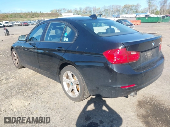 2015 BMW 3 Series 320i with VIN WBA3B1G55FNT04870, listed as a IAAI auction lot 42141211 with 249,720 mi miles. Bid and sale history available at carsss.com. Image 3.