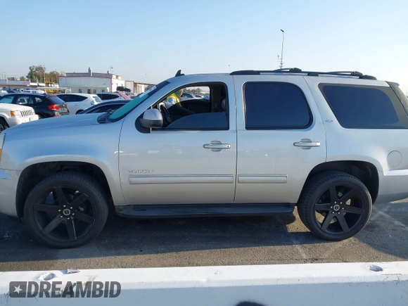 2010 GMC Yukon SLT with VIN 1GKUCCE00AR255901, listed as a IAAI auction lot 42149960 with 196,014 mi miles. Bid and sale history available at carsss.com. Image 14.