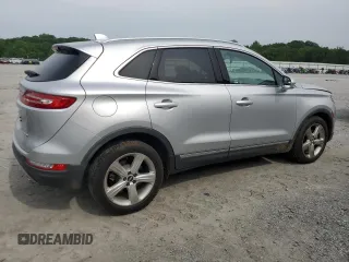 2017 Lincoln MKC Premiere with VIN 5LMCJ1C91HUL32617, listed as a Copart auction lot 57444215 with 106,285 mi miles and Salvage title. Bid and sale history available at DreamBid. Image 3.