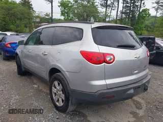 2012 Chevrolet Traverse 1LT with VIN 1GNKRGED5CJ255266, listed as a IAAI auction lot 42093175 with 103,730 mi miles and . Bid and sale history available at DreamBid. Image 3.