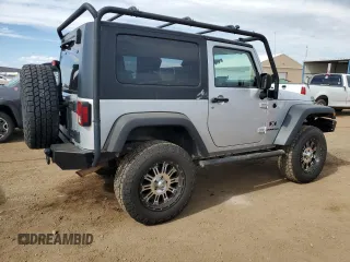 2009 Jeep Wrangler X with VIN 1J4FA24199L787574, listed as a Copart auction lot 58189835 with 74,331 mi miles and Salvage title. Bid and sale history available at DreamBid. Image 3.