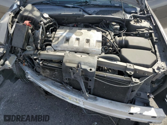 2002 Cadillac DeVille DHS z VIN 1G6KE57Y22U291523, wystawiony jako Copart lot #45711095 z przebiegiem 160 364 mil mil oraz Szkoda całkowita • Salvage title. Historia ofert i sprzedaży dostępna na DreamBid. Obrazek 12.
