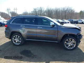 2019 Jeep Grand Cherokee Summit with VIN 1C4RJFJG1KC637757, listed as a IAAI auction lot 41803356 with 95,231 mi miles. Bid and sale history available at carsss.com. Image 13.