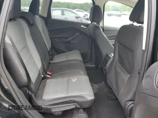 2016 Ford Escape SE z VIN 1FMCU0GX9GUB56962, wystawiony jako Copart lot #57071515 z przebiegiem 150 792 mil mil oraz Szkoda całkowita • Salvage title. Historia ofert i sprzedaży dostępna na DreamBid. Obrazek 11.
