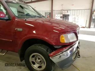 1999 Ford F-150 with VIN 1FTRF18W8XNB97257, listed as a Copart auction lot 87857815 with Not provided miles and Salvage title. Bid and sale history available at DreamBid. Image 11.