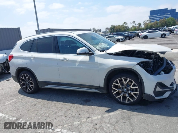 2020 BMW X1 xDrive28i with VIN WBXJG9C04L5R18165, listed as a IAAI auction lot 42313313 with 46,815 mi miles and . Bid and sale history available at DreamBid. Image 14.