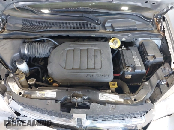 2019 Dodge Grand Caravan SE with VIN 2C4RDGBG3KR571537, listed as a IAAI auction lot 42036875 with 95,190 mi miles and . Bid and sale history available at DreamBid. Image 10.