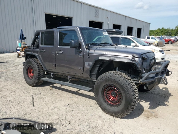 2016 Jeep Wrangler Unlimited Rubicon with VIN 1C4BJWFG8GL192077, listed as a Copart auction lot 58339005 with 62,076 mi miles and Salvage title. Bid and sale history available at DreamBid. Image 4.