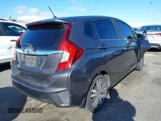 2015 Honda Fit EX-L z VIN 3HGGK5H89FM774299, wystawiony jako IAAI lot #41793448 z przebiegiem 142 228 mil mil oraz . Historia ofert i sprzedaży dostępna na DreamBid. Obrazek 4.