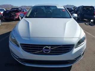 2015 Volvo S60 T5 Drive-E Premier z VIN YV140MFB4F2301427, wystawiony jako IAAI lot #41677045 z przebiegiem 103 262 mil mil oraz . Historia ofert i sprzedaży dostępna na DreamBid. Obrazek 13.