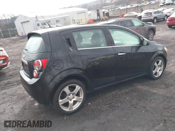2012 Chevrolet Sonic LTZ z VIN 1G1JE6SH2C4114048, wystawiony jako IAAI lot #41678246 z przebiegiem 138 863 mil mil oraz . Historia ofert i sprzedaży dostępna na DreamBid. Obrazek 4.