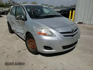 2009 Toyota Yaris with VIN JTDBT903391300394, listed as a Copart auction lot 53392945 with 227,210 mi miles and Salvage Title. Bid and sale history available at DreamBid. Image 11.