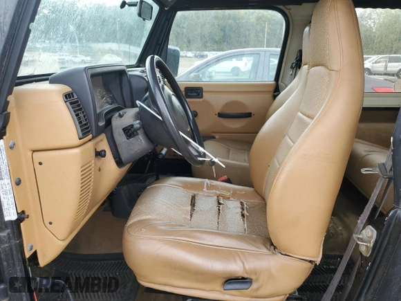 1997 Jeep Wrangler SE with VIN 1J4FY29P4VP486190, listed as a Copart auction lot 72914794 with 125,406 mi miles and Clean Title. Bid and sale history available at carsss.com. Image 7.