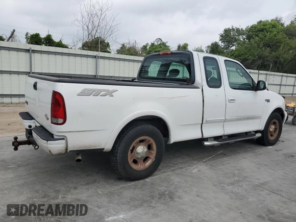 2003 Ford F-150 XL with VIN 2FTRX17273CA66963, listed as a Copart auction lot 55400945 with 244,942 mi miles and Clean title. Bid and sale history available at DreamBid. Image 3.
