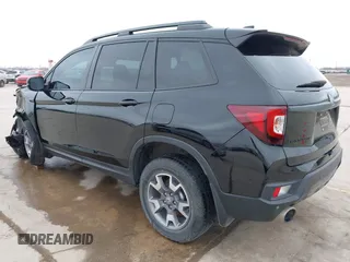 2023 Honda Passport TrailSport with VIN 5FNYF8H67PB006933, listed as a IAAI auction lot 41597859 with 34,145 mi miles and . Bid and sale history available at carsss.com. Image 3.
