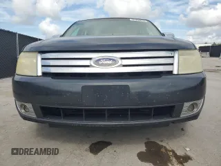 2008 Ford Taurus Limited with VIN 1FAHP25W78G128851, listed as a Copart auction lot 61254015 with 216,335 mi miles and Salvage title. Bid and sale history available at DreamBid. Image 5.