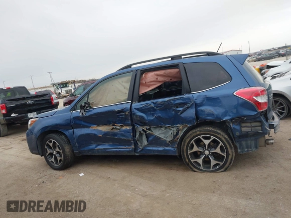 2014 Subaru Forester XT Touring with VIN JF2SJGMC9EH428341, listed as a IAAI auction lot 41185804 with 111,000 mi miles and . Bid and sale history available at DreamBid. Image 14.