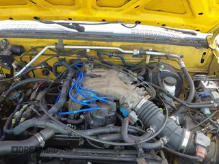 2000 Nissan Frontier XE z VIN 1N6ED26T7YC360056, wystawiony jako IAAI lot #42354804 z przebiegiem Nie podano mil oraz . Historia ofert i sprzedaży dostępna na DreamBid. Obrazek 10.
