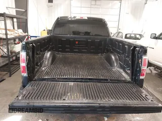 2014 Ford F-150 XL with VIN 1FTMF1EM8EFB34695, listed as a IAAI auction lot 41743020 with 129,749 mi miles. Bid and sale history available at carsss.com. Image 12.