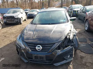 2018 Nissan Altima 2.5 SV with VIN 1N4AL3AP6JC244153, listed as a IAAI auction lot 41658699 with 54,486 mi miles. Bid and sale history available at carsss.com. Image 12.