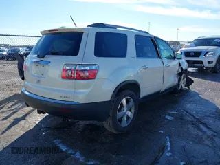 2010 GMC Acadia SLT1 with VIN 1GKLVMED0AJ167282, listed as a IAAI auction lot 41227299 with 121,293 mi miles. Bid and sale history available at carsss.com. Image 4.