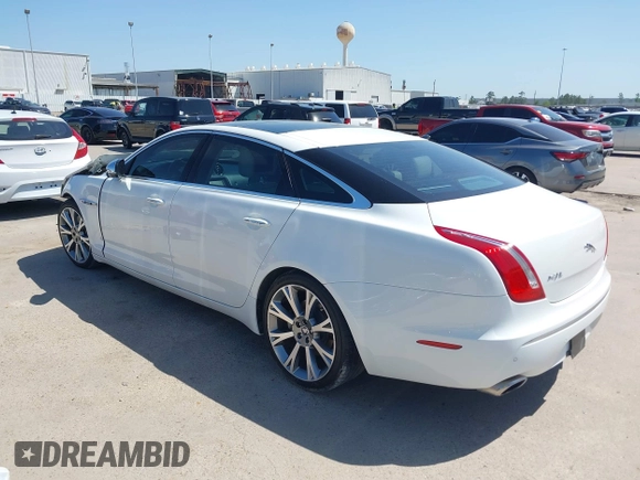 2012 Jaguar XJ XJL with VIN SAJWA2GB3CLV38500, listed as a IAAI auction lot 41990409 with 73,793 mi miles and . Bid and sale history available at DreamBid. Image 3.
