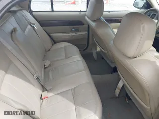 2005 Mercury Grand Marquis LS Premium with VIN 2MEFM75W35X654244, listed as a IAAI auction lot 42090783 with 120,033 mi miles. Bid and sale history available at carsss.com. Image 8.