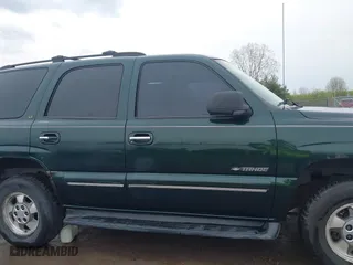 2002 Chevrolet Tahoe LT with VIN 1GNEK13Z22J154097, listed as a IAAI auction lot 41913119 with 243,978 mi miles. Bid and sale history available at carsss.com. Image 13.