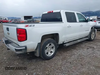 2018 Chevrolet Silverado 1500 LT with VIN 3GCUKREC0JG594914, listed as a IAAI auction lot 41735134 with 98,407 mi miles. Bid and sale history available at carsss.com. Image 4.