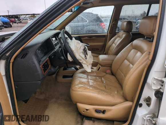 1996 Jeep Grand Cherokee Limited with VIN 1J4GZ78Y0TC185669, listed as a Copart auction lot 79032274 with 184,929 mi miles and Salvage Title. Bid and sale history available at carsss.com. Image 7.