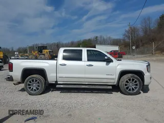 2017 GMC Sierra 1500 Denali with VIN 3GTU2PEC5HG164021, listed as a IAAI auction lot 41784101 with 69,167 mi miles and . Bid and sale history available at DreamBid. Image 14.