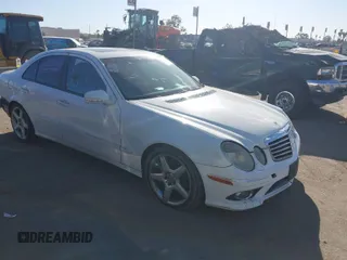 2009 Mercedes-Benz E-Class Luxury 3.5L with VIN WDBUF56X49B406302, listed as a IAAI auction lot 41686766 with 166,363 mi miles. Bid and sale history available at carsss.com. Image 1.