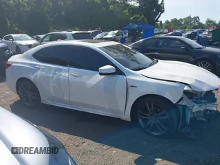 2019 Acura TLX w/A-Spec Pkg z VIN 19UUB2F66KA003762, wystawiony jako IAAI lot #40118141 z przebiegiem 66 341 mil mil oraz . Historia ofert i sprzedaży dostępna na DreamBid. Obrazek 13.