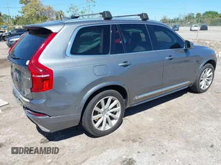 2016 Volvo XC90 T6 Inscription with VIN YV4A22PL4G1034597, listed as a IAAI auction lot 41787550 with 118,744 mi miles. Bid and sale history available at carsss.com. Image 4.