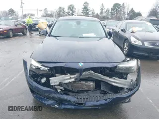 2015 BMW 3 Series 328i Gran Turismo xDrive with VIN WBA3X5C5XFD562161, listed as a IAAI auction lot 41570204 with 71,405 mi miles and . Bid and sale history available at DreamBid. Image 6.