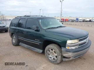 2001 Chevrolet Tahoe LS z VIN 1GNEC13T71R126532, wystawiony jako IAAI lot #38800312 z przebiegiem 279 764 mil mil oraz . Historia ofert i sprzedaży dostępna na DreamBid. Obrazek 1.