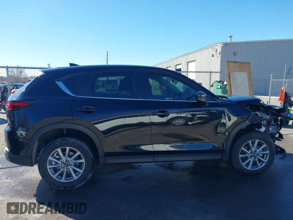 2023 Mazda CX-5 2.5 S with VIN JM3KFBAM9P0230299, listed as a IAAI auction lot 41656657 with 17,290 mi miles. Bid and sale history available at carsss.com. Image 14.
