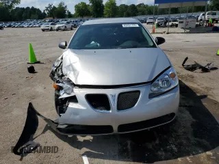 2006 Pontiac G6 GT with VIN 1G2ZH558464230447, listed as a Copart auction lot 62491755 with 157,596 mi miles and Salvage title. Bid and sale history available at DreamBid. Image 5.