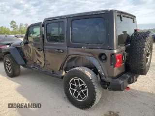 2024 Jeep Wrangler Rubicon z VIN 1C4PJXFG6RW261748, wystawiony jako Copart lot #51479585 z przebiegiem 7 911 mil mil oraz Szkoda całkowita • Salvage title. Historia ofert i sprzedaży dostępna na DreamBid. Obrazek 2.