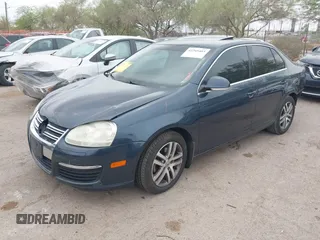 2006 Volkswagen Jetta 1.9L TDI with VIN 3VWDT71K36M758287, listed as a IAAI auction lot 42245403 with 230,536 mi miles and . Bid and sale history available at DreamBid. Image 2.