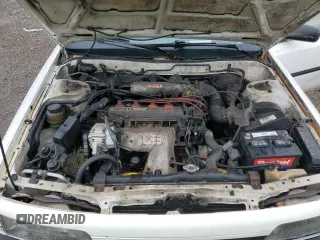 1991 Toyota Camry z VIN JT2SV21E2M3435406, wystawiony jako Copart lot #74958494 z przebiegiem 127 580 mil mil oraz Szkoda całkowita • Salvage title. Historia ofert i sprzedaży dostępna na DreamBid. Obrazek 11.