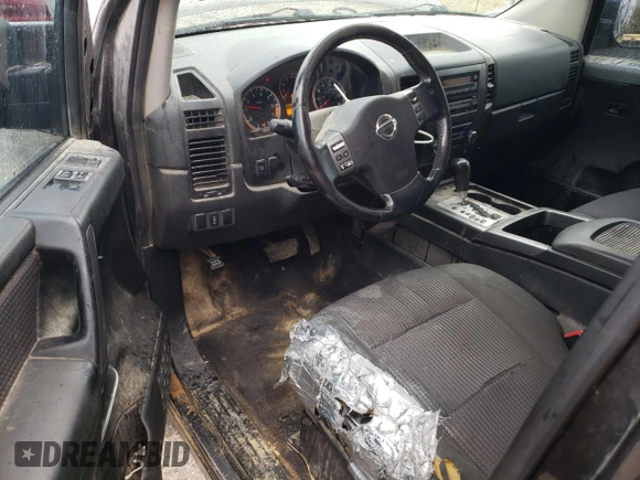 2010 Nissan Titan SE with VIN 1N6AA0CA9AN319565, listed as a Copart auction lot 44175775 with 214,303 mi miles and Salvage Title. Bid and sale history available at carsss.com. Image 8.