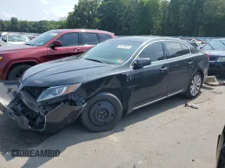 2013 Lincoln MKS EcoBoost with VIN 1LNHL9FT9DG613906, listed as a Copart auction lot 74219844 with 179,950 mi miles and Salvage Title. Bid and sale history available at carsss.com. Image 1.