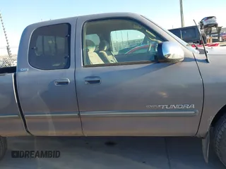 2000 Toyota Tundra SR5 with VIN 5TBRT3413YS019873, listed as a IAAI auction lot 41412497 with 305,472 mi miles and . Bid and sale history available at DreamBid. Image 13.