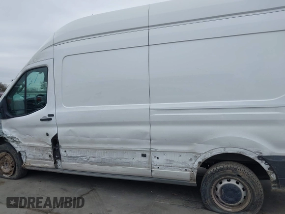 2021 Ford Transit Cargo with VIN 1FTBR1X82MKA98734, listed as a IAAI auction lot 41424123 with 84,453 mi miles and . Bid and sale history available at DreamBid. Image 14.