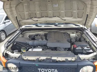 2010 Toyota FJ Cruiser with VIN JTEBU4BF1AK095319, listed as a IAAI auction lot 41721065 with 126,262 mi miles. Bid and sale history available at carsss.com. Image 10.